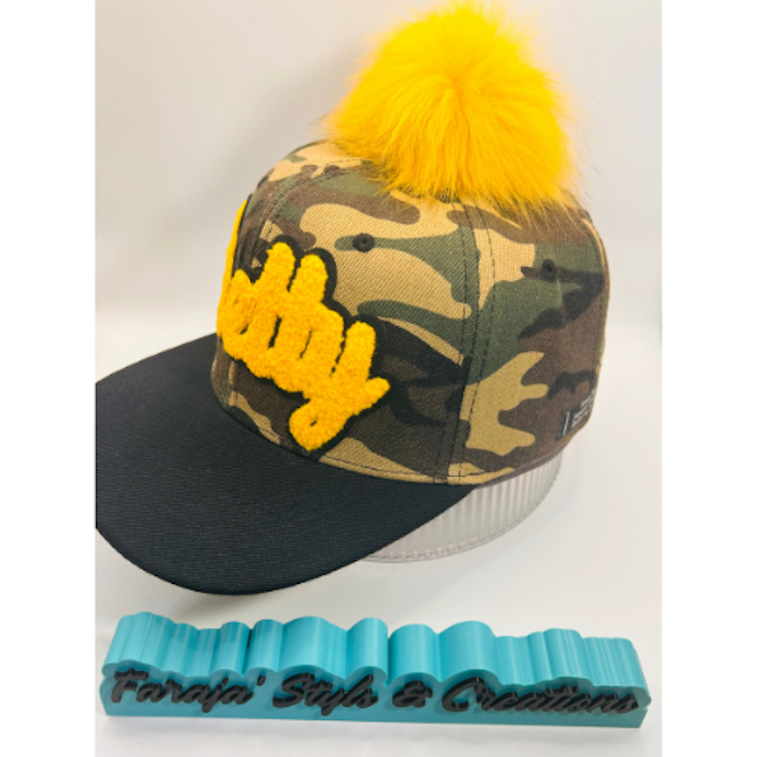 Camo Snapback Hat with Golden Yellow Chenille “Pretty” Patch & Pom Pom Ball | Pretty Girl Collection
